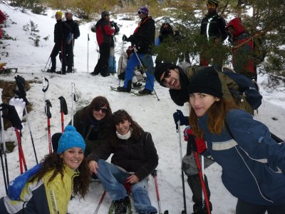 Raquetas de nieve de noche y cena en Navacerrada