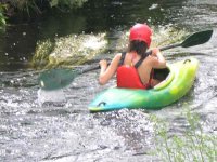  Kayaking through calm waters 