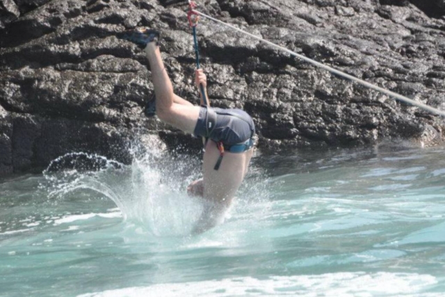  Entering head first into the water