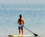 Con la tabla y el remo