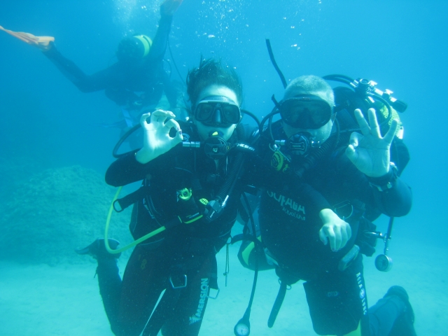  Divers together underwater 
