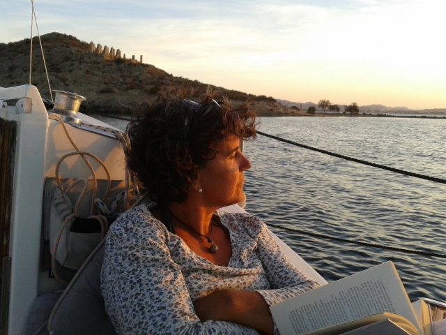  Reading at sunset on the boat 