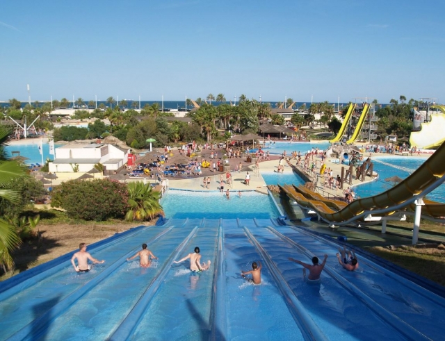  Going down the slide at the same time 
