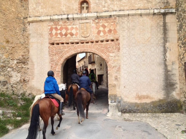  Horseback riding towards the interior of the town 
