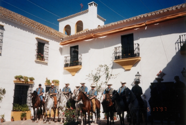  central patio of the hacienda with horsemen 