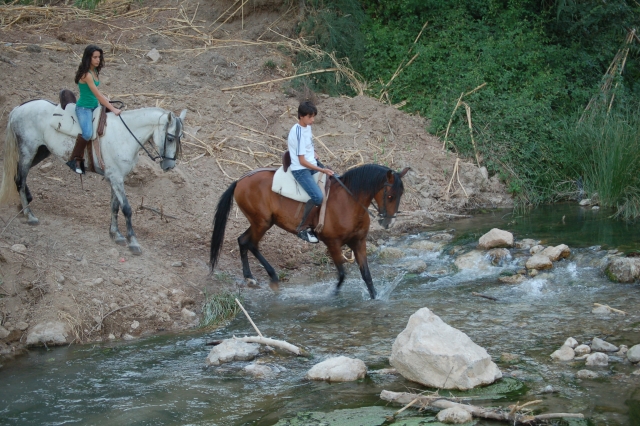 A caballo por el rio