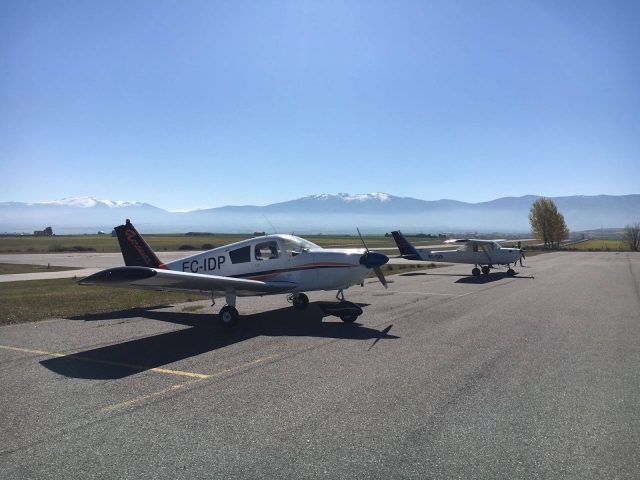  Airplanes with the mountain range in the background 