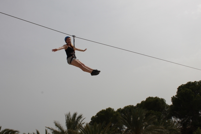  Hanging from the zip line 