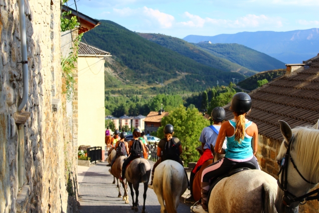  Going out on horseback through the town 
