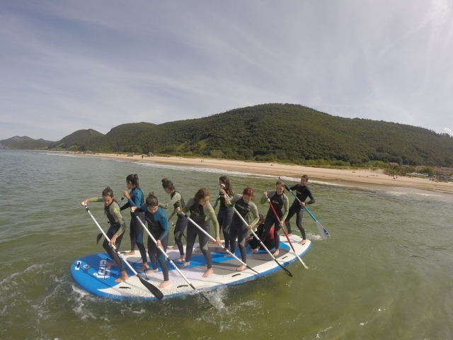  Girls with the instructor on the sup board 