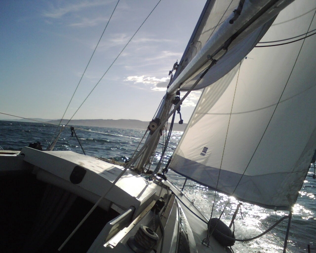  Sailboat between the waves