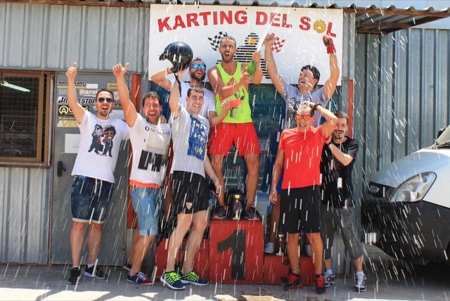  Celebrating the victory with champagne 