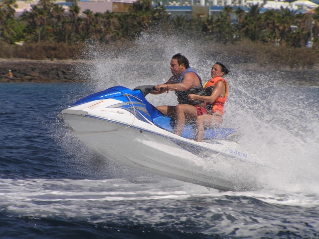 A couple on our jet ski with capacity for two people 