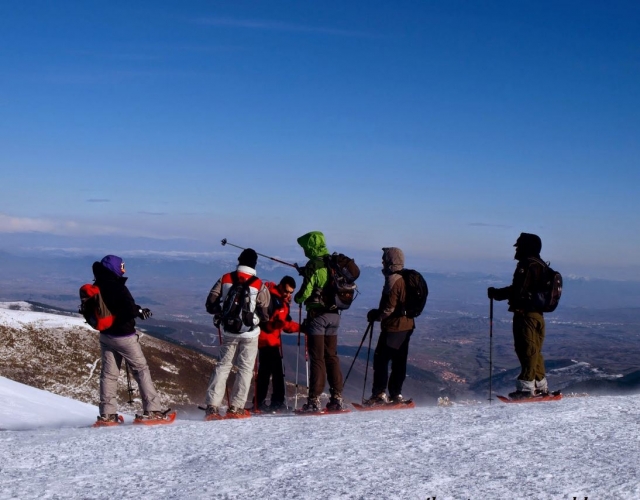  At the top with snowshoes 