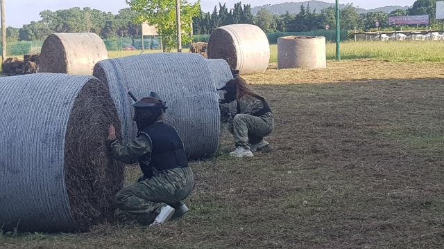  In the middle of a paintball battle 