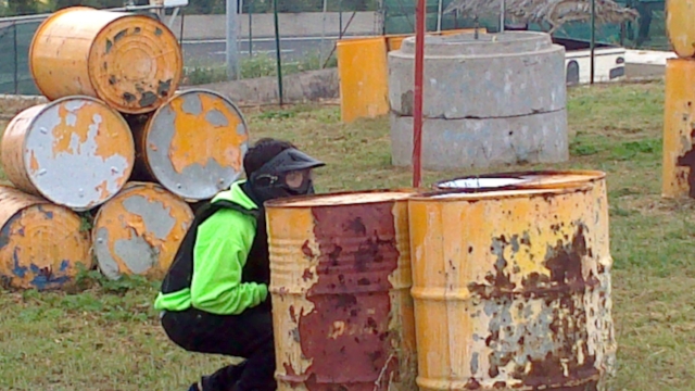 hidden behind barrels 