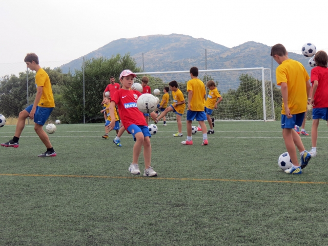  children training soccer with their balls.JPG 