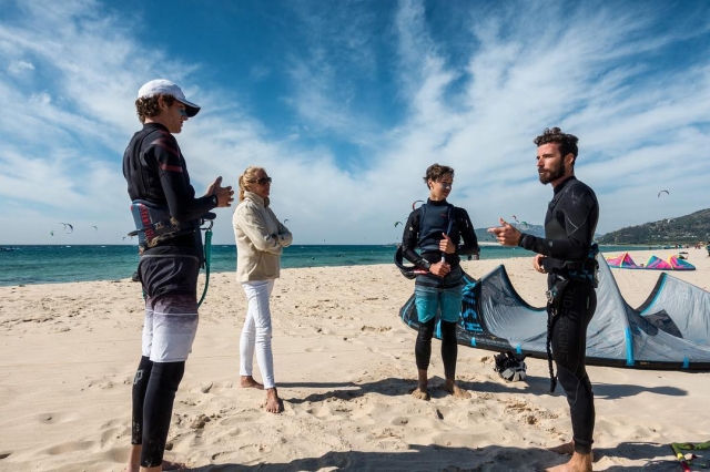 Listening to the explanations on the shore