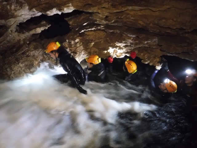  Adventure caving with neoprene 