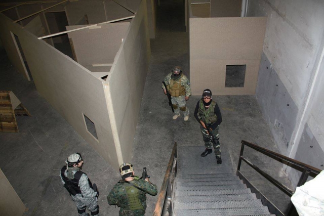  friends playing airsoft 