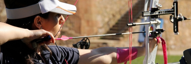  girl practicing archery 
