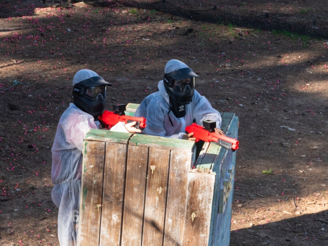  Paintball players aiming 