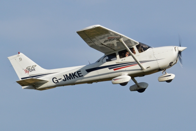  Cessna small plane in the air 