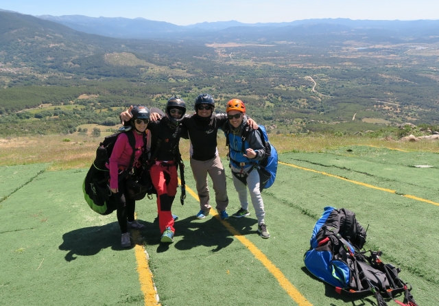  Posing with the paragliding passengers 