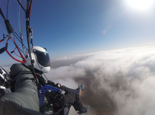  Paragliding above the clouds 