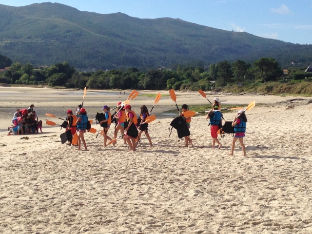  With the paddles in the sand 