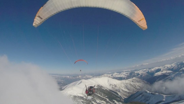  Flying over a snowy area 