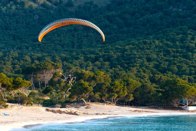 paramotor over island 