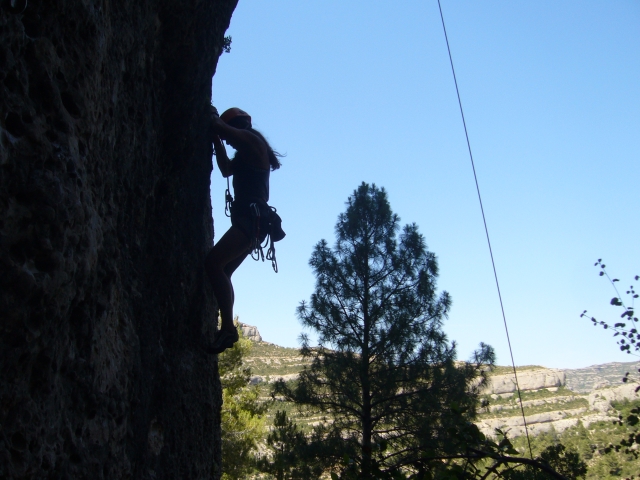  With climbing equipment 