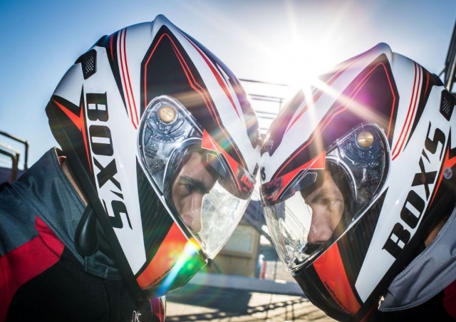  Drivers joining helmets 