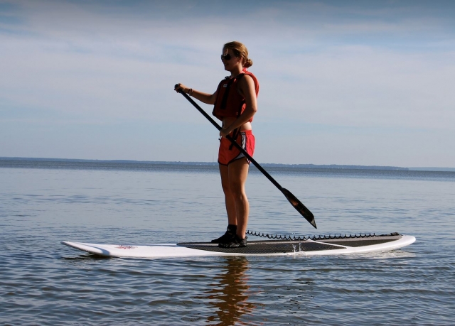  Girl on a white sup board 
