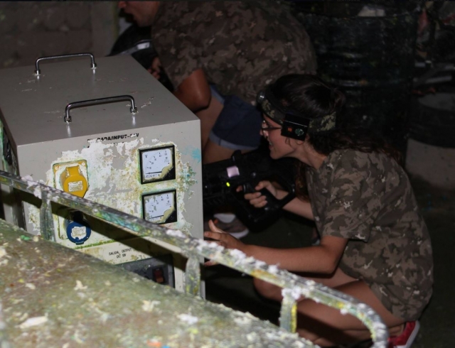  Crouching during the laser tag game 