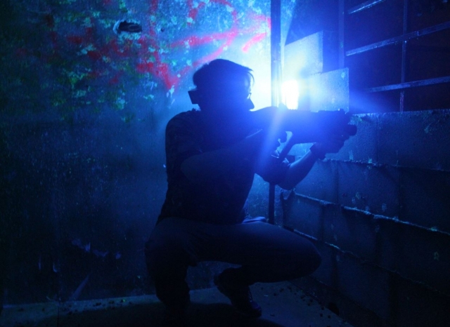  Player illuminated by blue light 