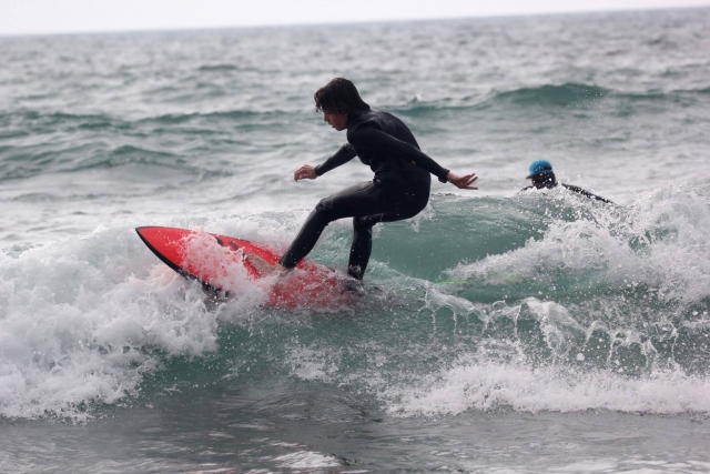  Surfer with red board