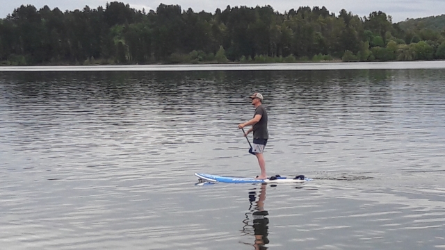  Paddle surfing in calm waters 