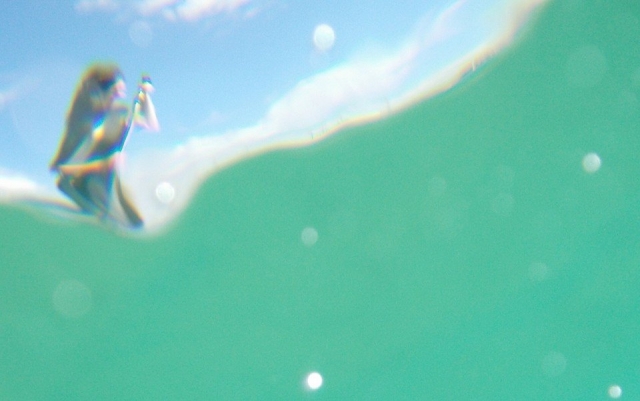  Paddling on the water on the board 
