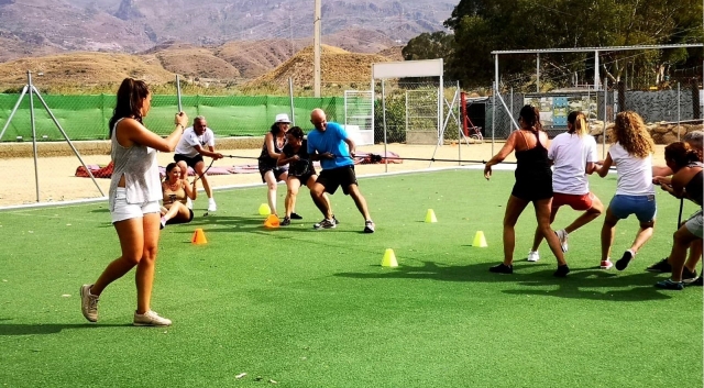  Competing teams pulling the rope 