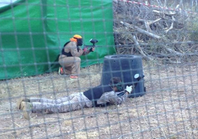  Working on their paintball strategy 