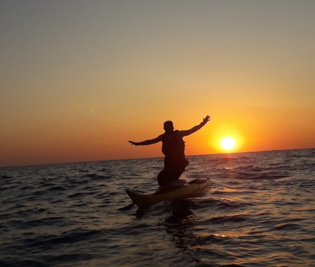 Puesta de sol en kayak