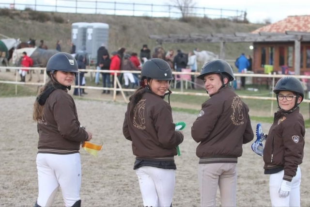  A group of four girls belonging to our school during the celebration of an event