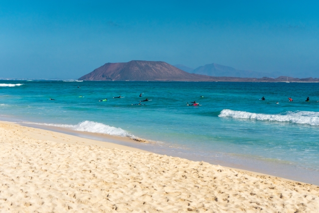  Beach full of surfers 