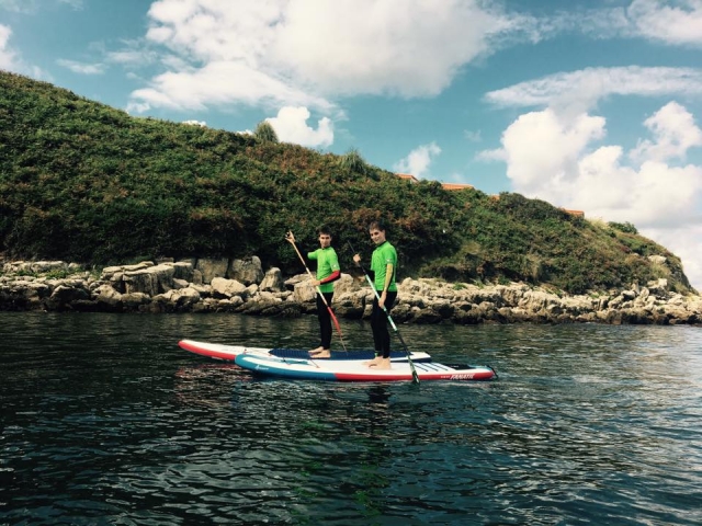  Doing paddle surfing 