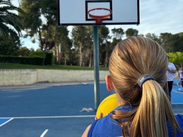  Summer camps playing basketball 