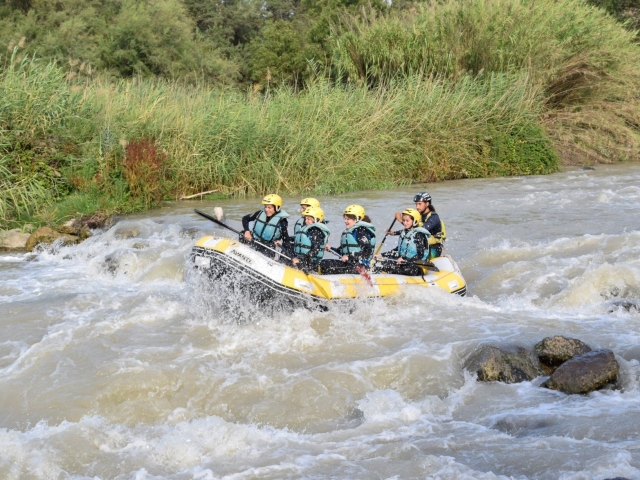  Friends rafting on the river 