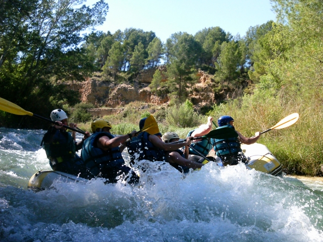  Paddling on the rapid 