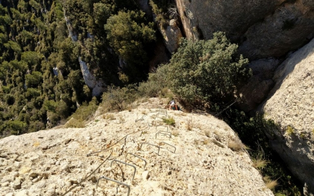  Impressive view from the heights of two users on a vertical wall 